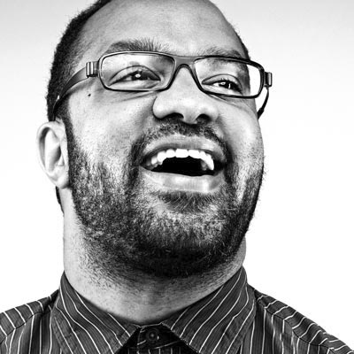 A black and white portrait photo of Forest Young.